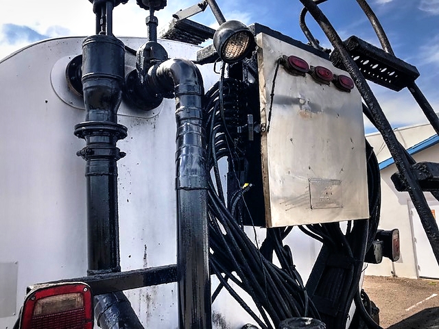 1995 International 2574 with BC-501 2,100 Gallon Bearcat Spreader Unit Asphalt Distributor Truck