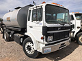 1989 Mack Cab-Over with 2,200 Gallon Bearcat Spreader Unit
