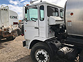 1989 Mack Cab-Over with 2,200 Gallon Bearcat Spreader Unit