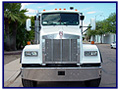 2003 Kenworth W-900 Heavy Spec with 2006 Edge Roll-Off