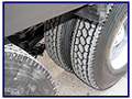 2003 Kenworth W-900 Heavy Spec with 2006 Edge Roll-Off