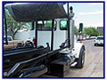 2003 Kenworth W-900 Heavy Spec with 2006 Edge Roll-Off